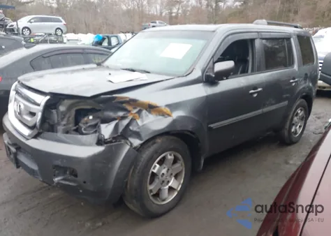 2010 Honda Pilot Touring z USA, uszkodzony, nr VIN 5FNYF4H8XAB004756